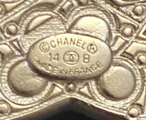 authentic chanel brooch vs fake|Chanel necklace knockoff.